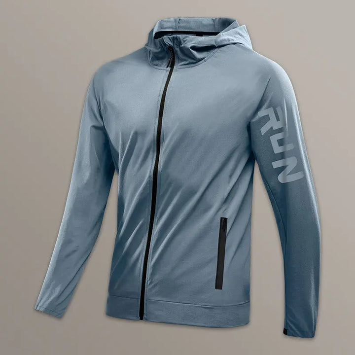 Men’s light blue zip-up running jacket with hood and 'RUN' sleeve print – breathable activewear outer layer