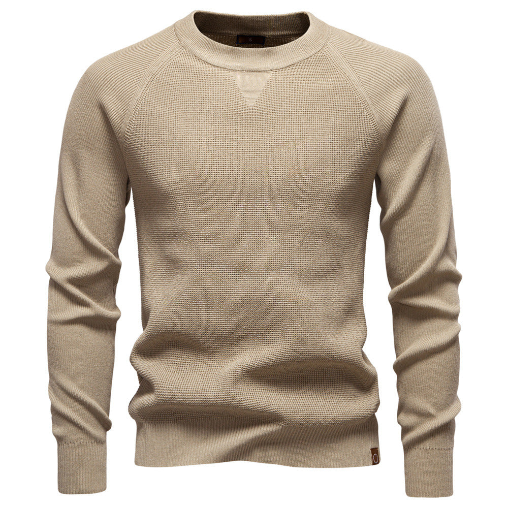 Beige sweater on a white background