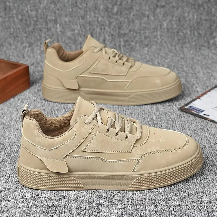 A pair of beige UrbanEase casual shoes with lace-up closure