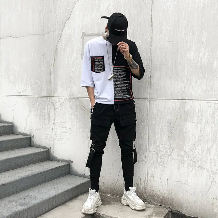 Men’s black streetwear cargo joggers with zipper pockets and straps – urban utility pants