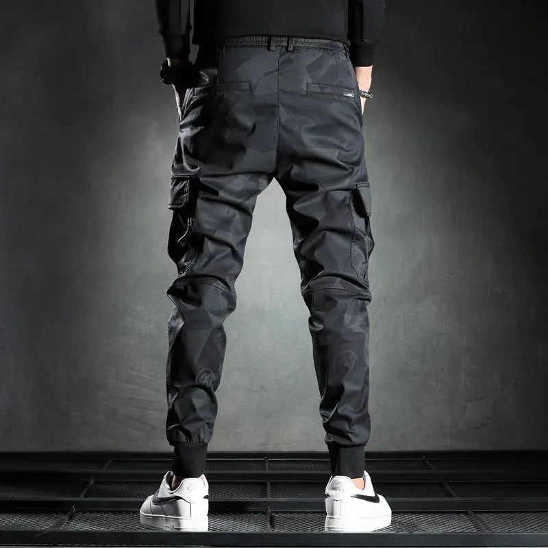 Men's black cargo jogger pants – streetwear style with utility pockets and patch details
