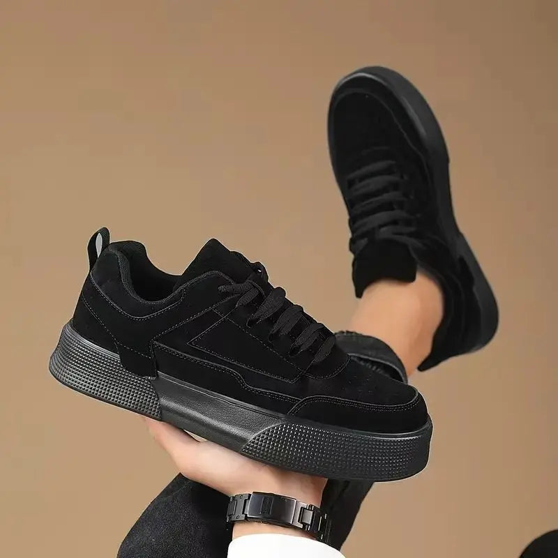 A pair of black UrbanEase casual shoes with lace-up closure