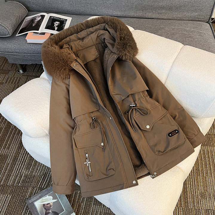 Warm fur-lined winter jacket for women in brown – stylish utility parka with multiple pockets for cold-weather outfits.
