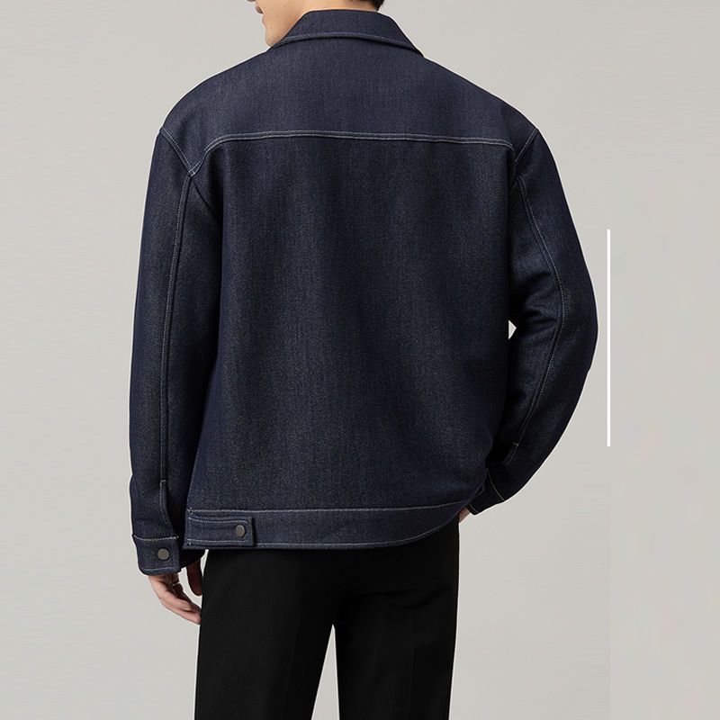Men’s dark blue classic denim jacket with clean stitched detailing – minimalist casual outerwear for modern everyday looks.