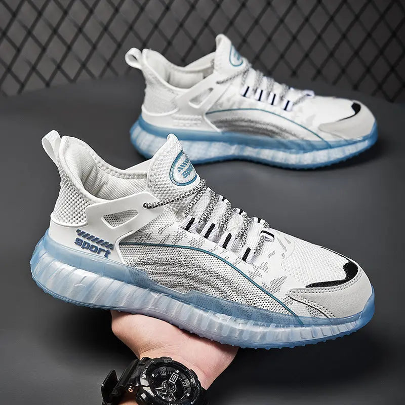 A pair of white and blue AllMotion Active Shoes with a breathable upper design and a non-slip rubber outsole