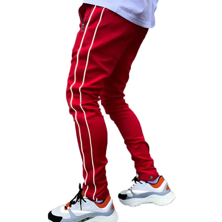 Red men’s side-stripe track pants – bold workout and streetwear hybrid