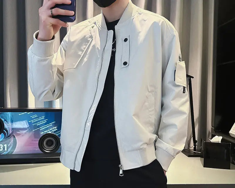 Men's white casual bomber jacket with zipper closure and utility sleeve pocket