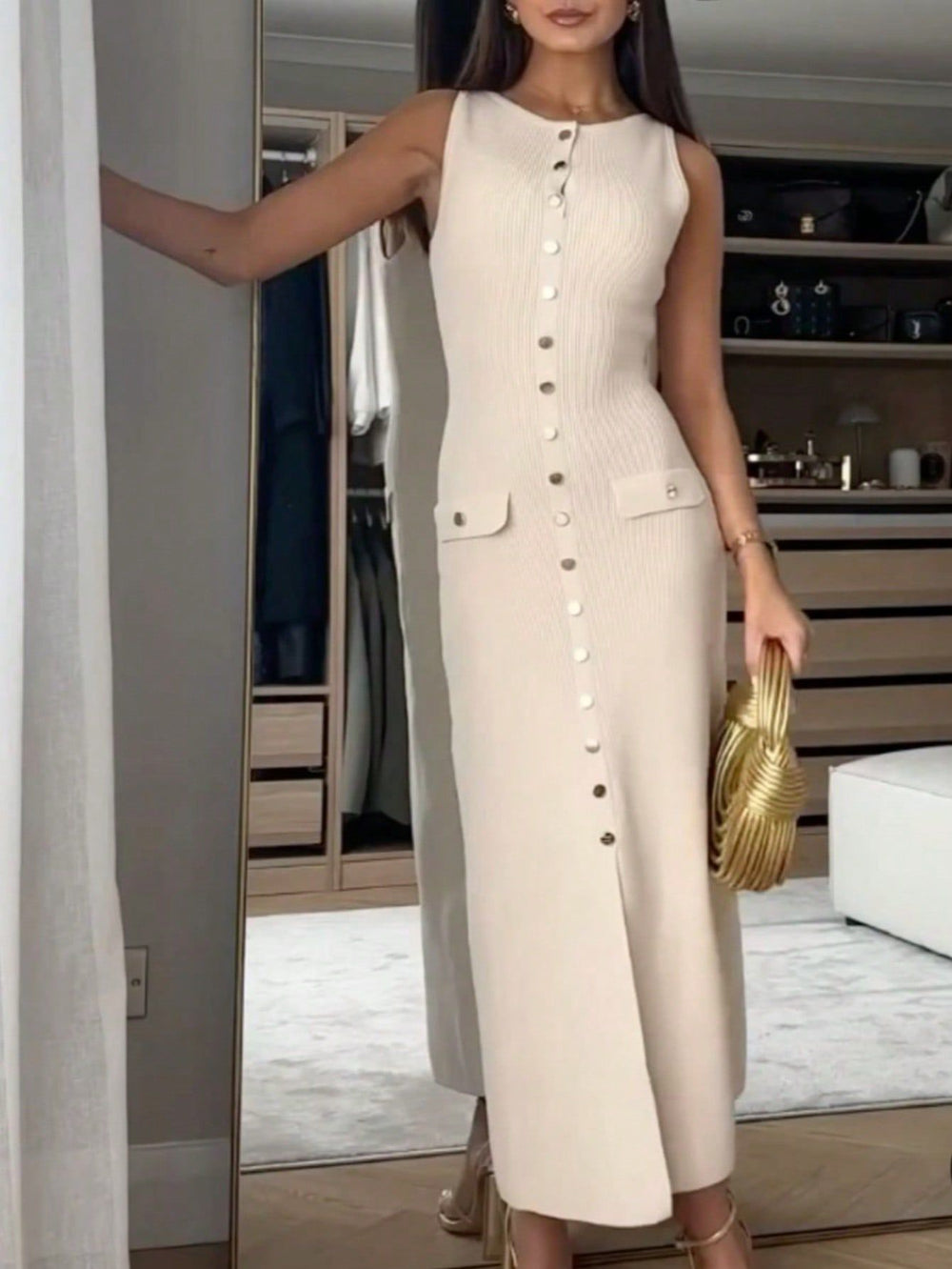 Chic cream sleeveless midi dress for women – slim fit dress with front slit and gold-tone buttons, ideal for casual chic or brunch looks.