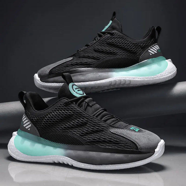 A pair of SleekMotion Running Sneakers with a black, grey, and green color scheme, showcasing the mesh upper and cushioning sole.