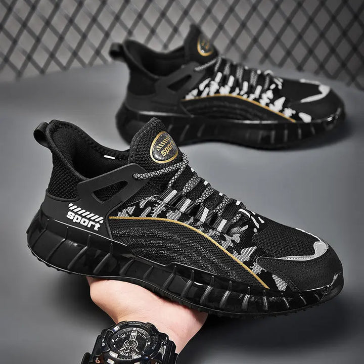 A pair of black AllMotion Active Shoes with a breathable upper design and a non-slip rubber outsole