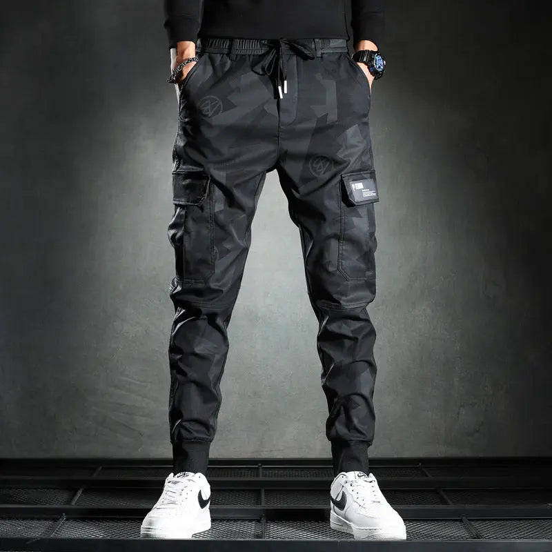 Men's black cargo jogger pants – streetwear style with utility pockets and patch details
