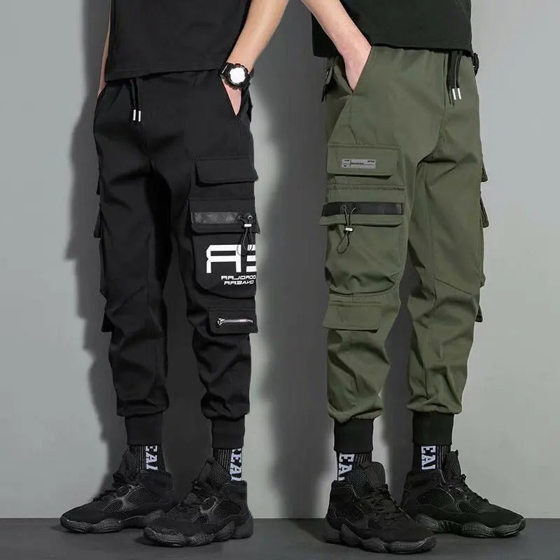 Men's black and olive green cargo joggers with zipper pockets – streetwear utility pants for casual outfits