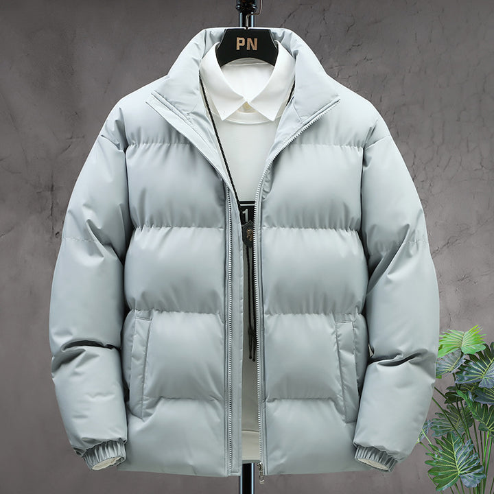 Men’s light blue puffer jacket. Quilted winter jacket with high collars and front zippers