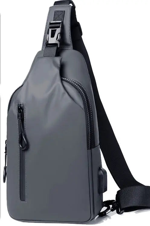 Men’s gray waterproof anti-theft sling chest bag with USB charging port – compact crossbody for travel and daily use
