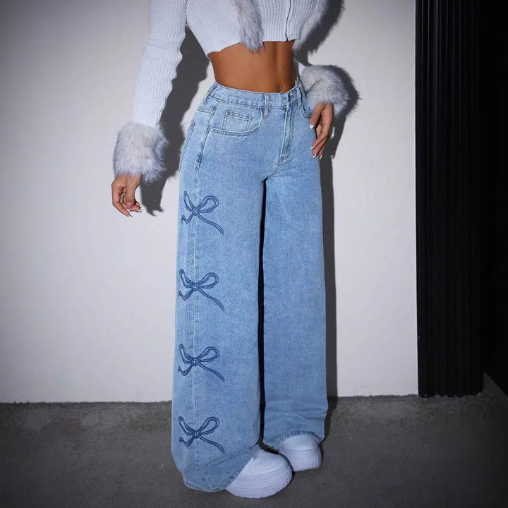 Women’s high-waisted wide-leg light blue jeans with bow embroidery detail – trendy Y2K streetwear denim pants