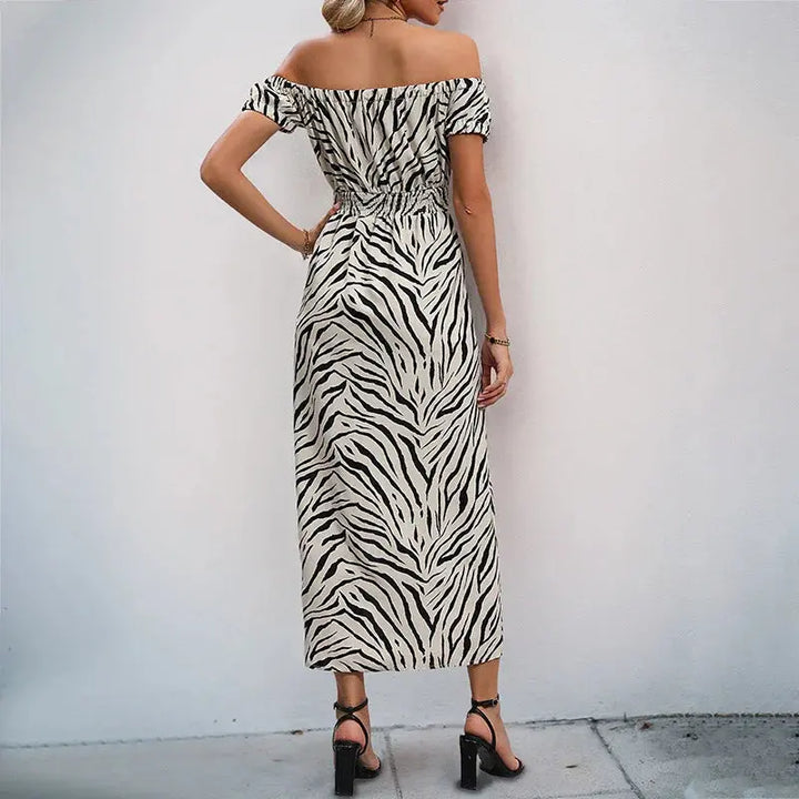 Women’s off-shoulder zebra print maxi dress with thigh-high slit and fitted waist – bold and elegant summer party outfit