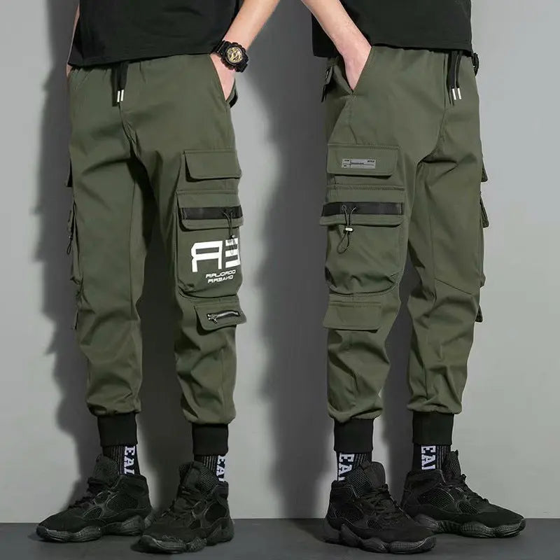 Olive green men's tactical joggers with multi-pocket design – urban streetwear style pants