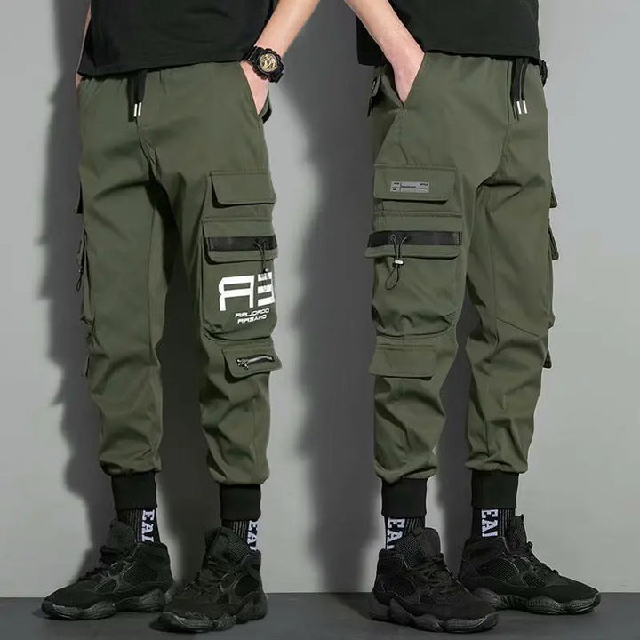 Olive green men's tactical joggers with multi-pocket design – urban streetwear style pants