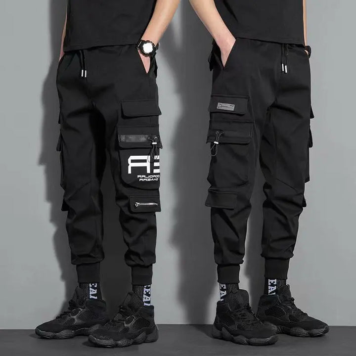 Men's black tactical joggers with bold logo – adjustable cuffed cargo pants for modern streetwear