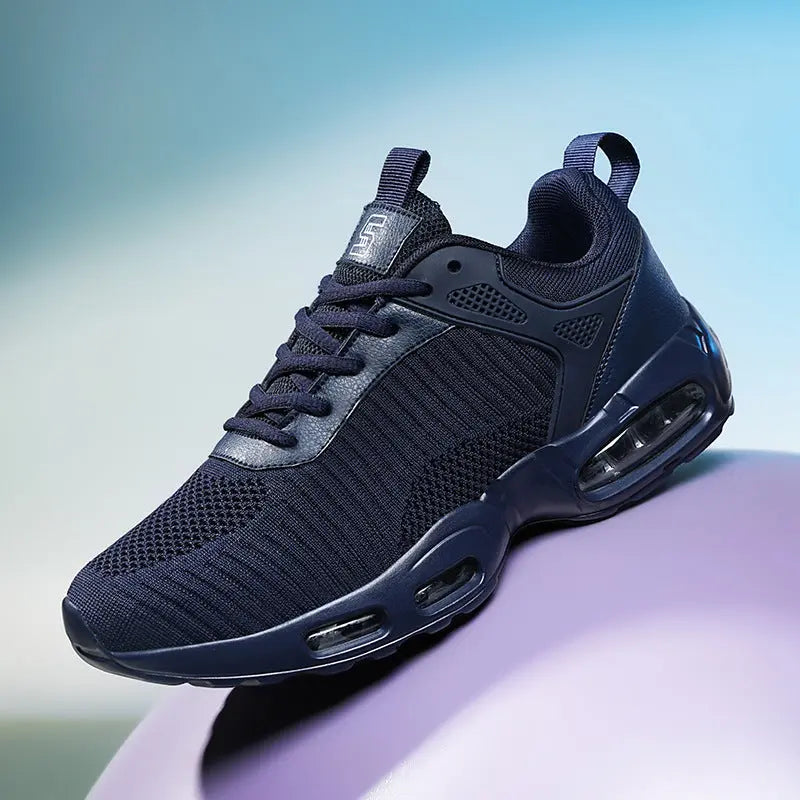 Blue athletic shoe with air cushioning on a light purple surface