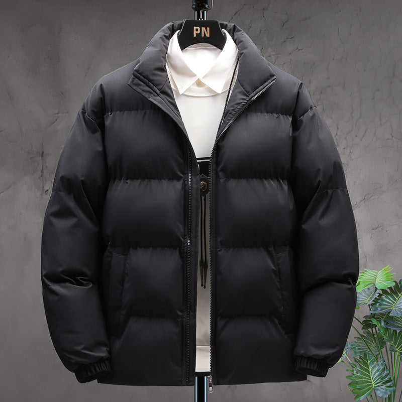 Men’s black puffer jacket. Quilted winter jacket with high collars and front zippers