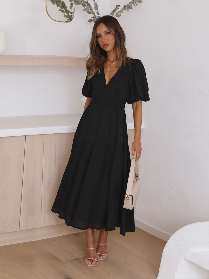 Elegant black V-neck midi dress for women – lightweight short sleeve flowy silhouette for casual and semi-formal wear