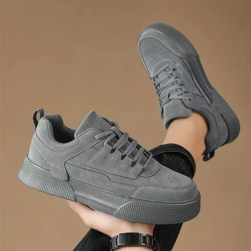 A pair of gray UrbanEase casual shoes with lace-up closure