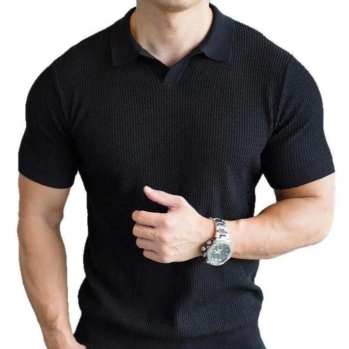 Men’s black textured knit polo shirt with short sleeves and collar – casual smart summer top