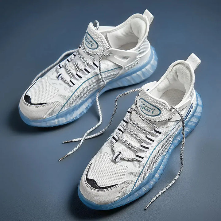 A pair of white and blue AllMotion Active Shoes with a breathable upper design and a non-slip rubber outsole