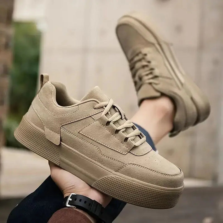 A pair of beige UrbanEase casual shoes with lace-up closure