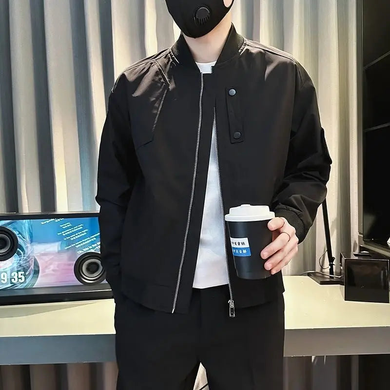 Men's black casual bomber jacket with zipper closure and utility sleeve pocket