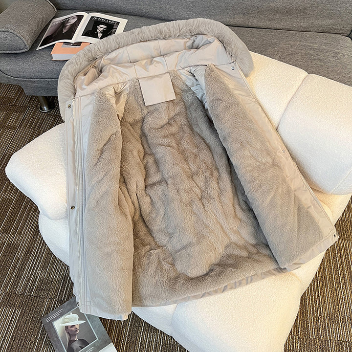 Warm fur-lined winter jacket for women in beige – stylish utility parka with multiple pockets for cold-weather outfits.