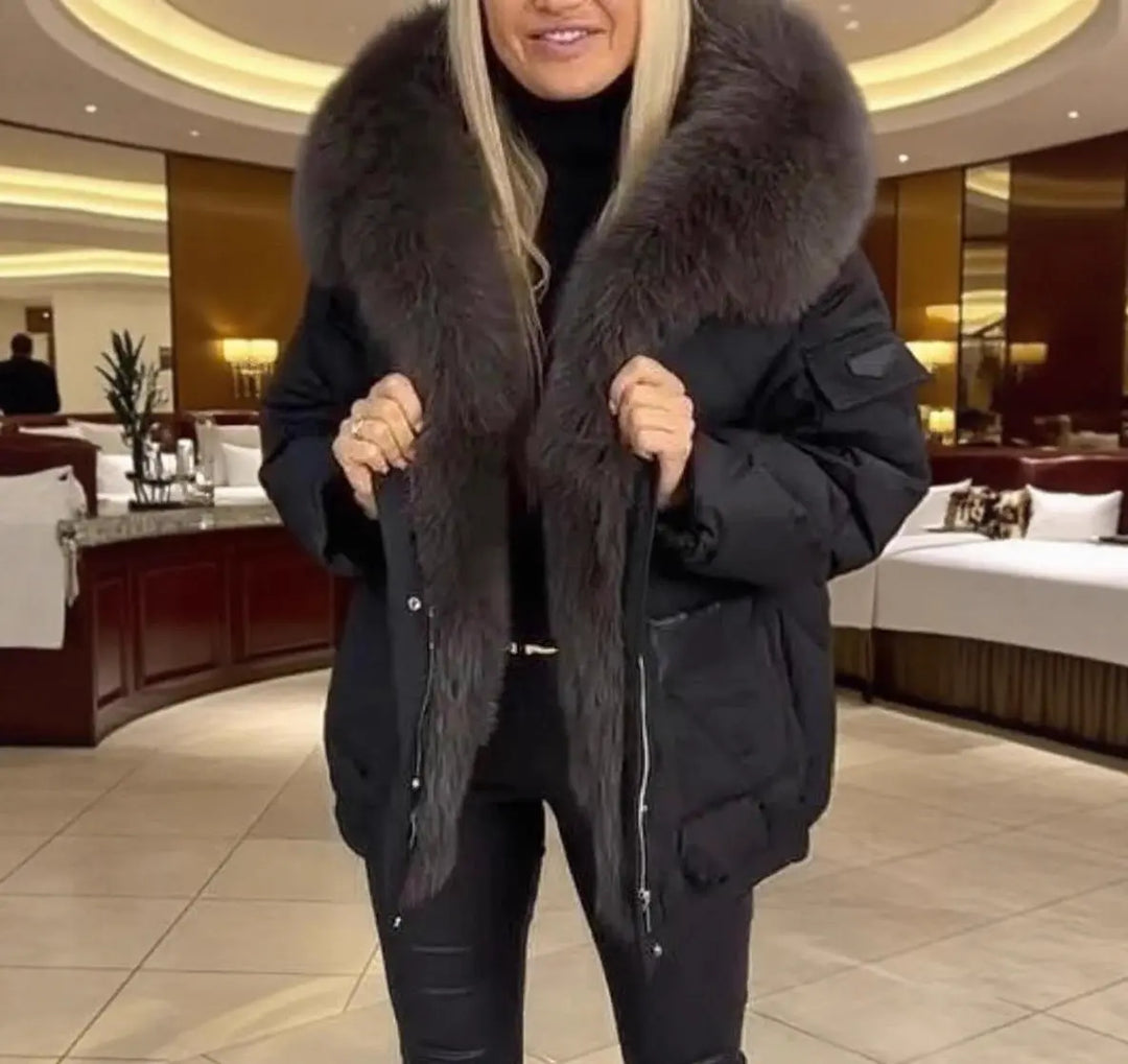 Black fur-lined women's parka jacket for winter – stylish outerwear with oversized faux fur hood