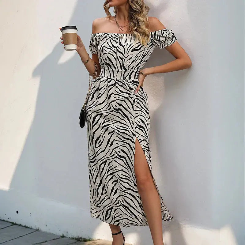 Women’s off-shoulder zebra print maxi dress with thigh-high slit and fitted waist – bold and elegant summer party outfit