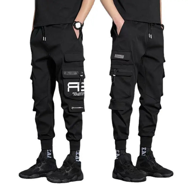 Men's black tactical joggers with bold logo – adjustable cuffed cargo pants for modern streetwear