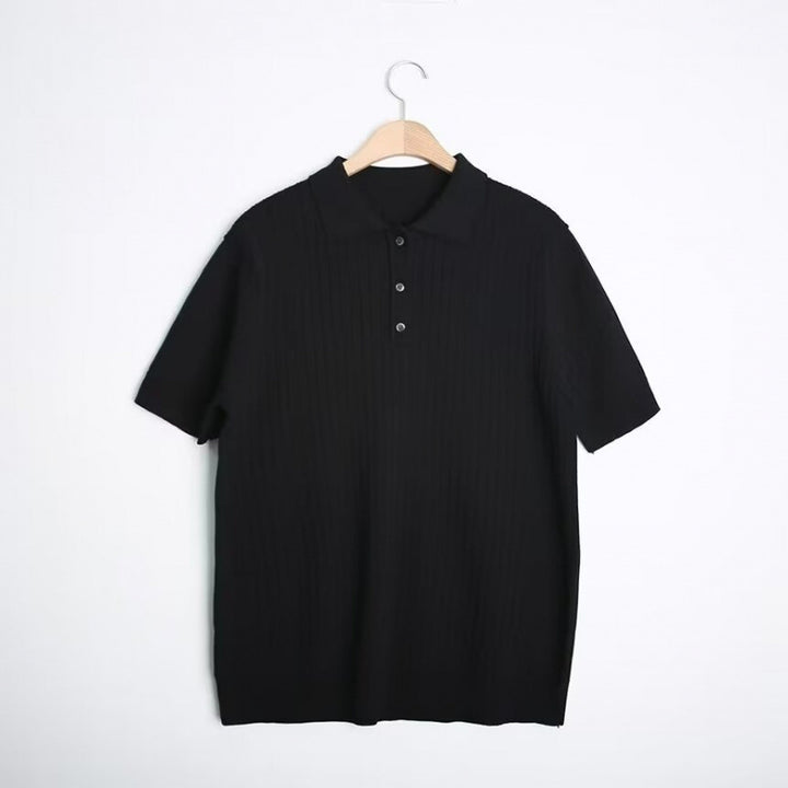 Men’s black short sleeve ribbed knit polo shirt with textured fabric and button collar