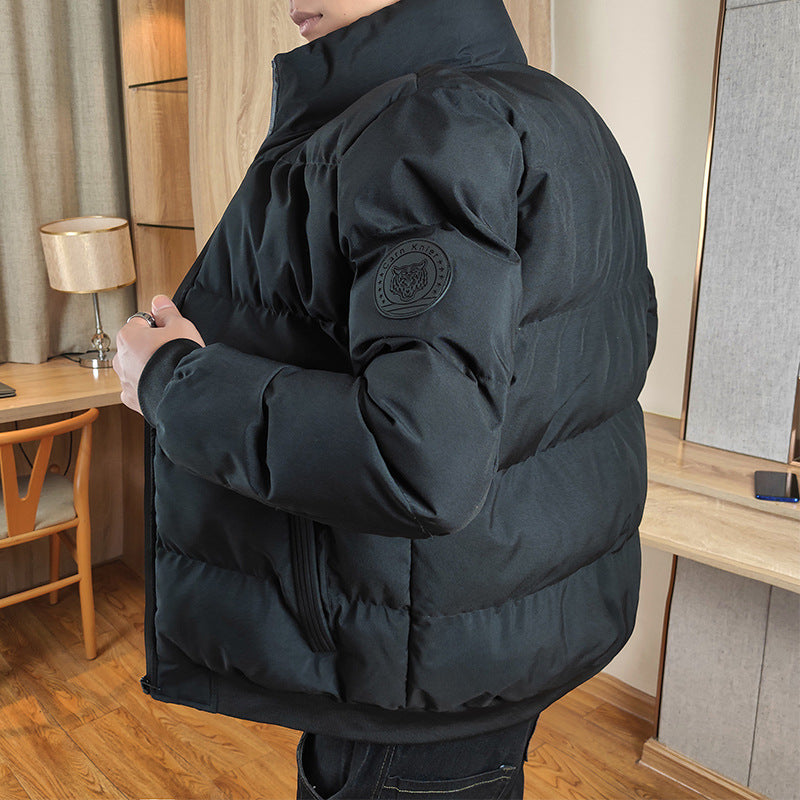 Men’s navy blue winter puffer jacket with high collar and zip closure – heavy-duty coat for freezing temperatures