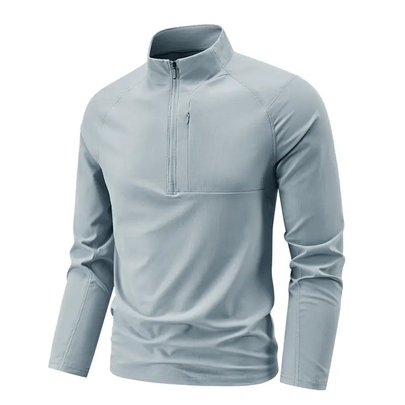 A light blue SportZip Active Tee with a half-zip design and long sleeves.