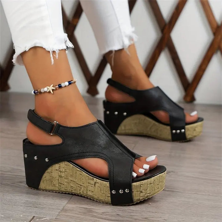 Women’s brown wedge sandals with cork platform sole, peep toe, ankle strap, and stud accents – casual summer footwear