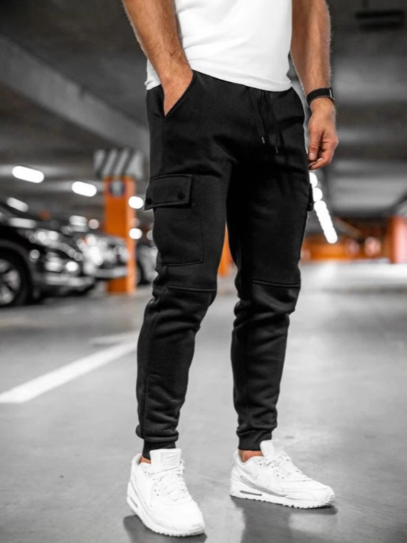 Men’s slim fit black cargo joggers – modern athletic streetwear pants with side pockets for versatile everyday wear.
