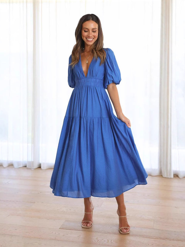 Women’s royal blue midi dress – flowy V-neck dress for casual elegance or daytime events.