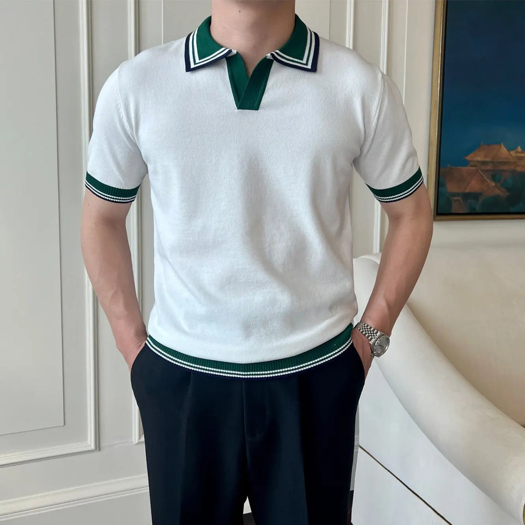 Men’s white short sleeve polo shirt with green contrast collar and sleeve trim – classic sporty knit shirt