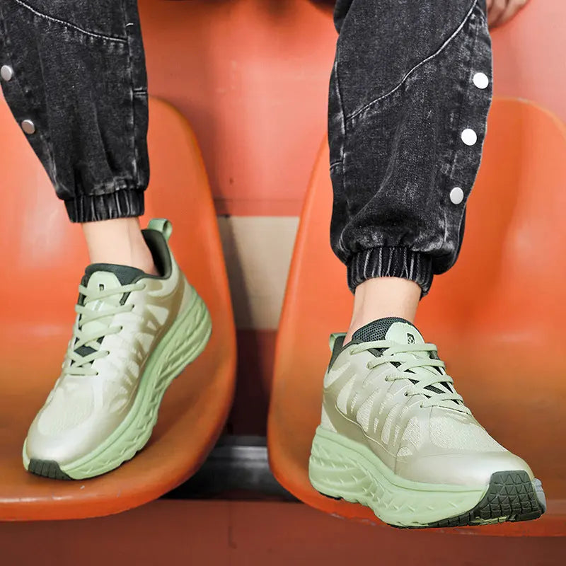 A pair of light green PureFit Sports Shoes
