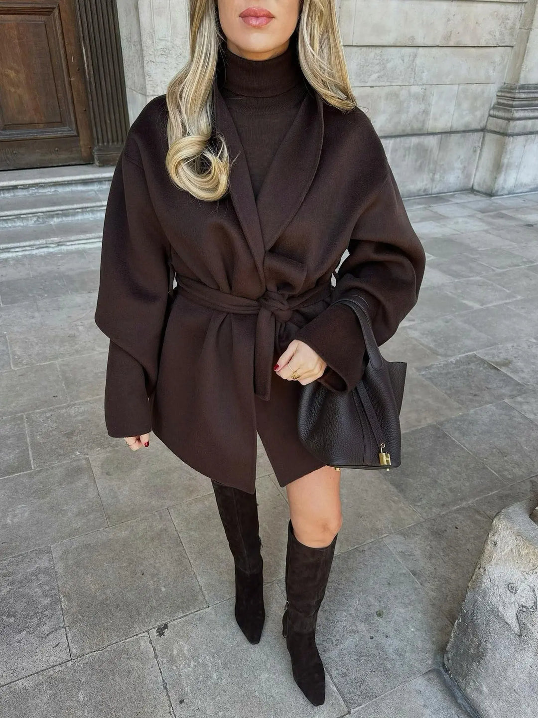 Women’s oversized wool coat in dark brown with belt – stylish fall and winter outerwear.