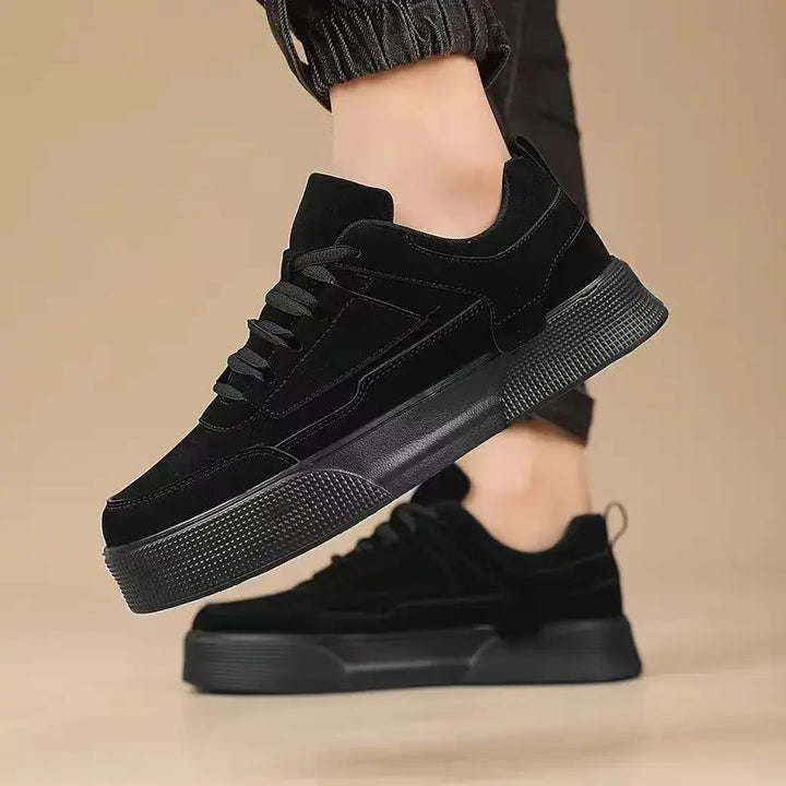 A pair of black UrbanEase casual shoes with lace-up closure