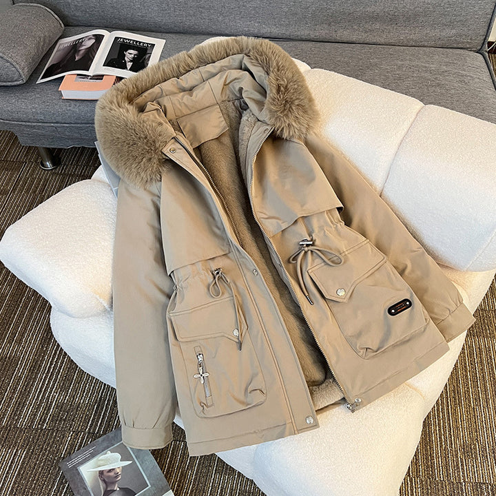 Warm fur-lined winter jacket for women in beige – stylish utility parka with multiple pockets for cold-weather outfits.