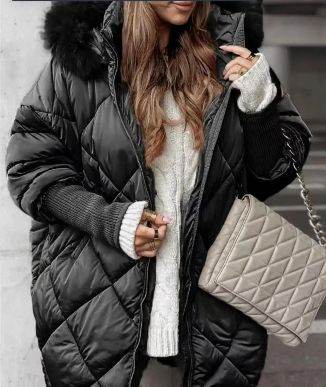 Classic black women's puffer jacket with hood – functional and fashionable winter coat
