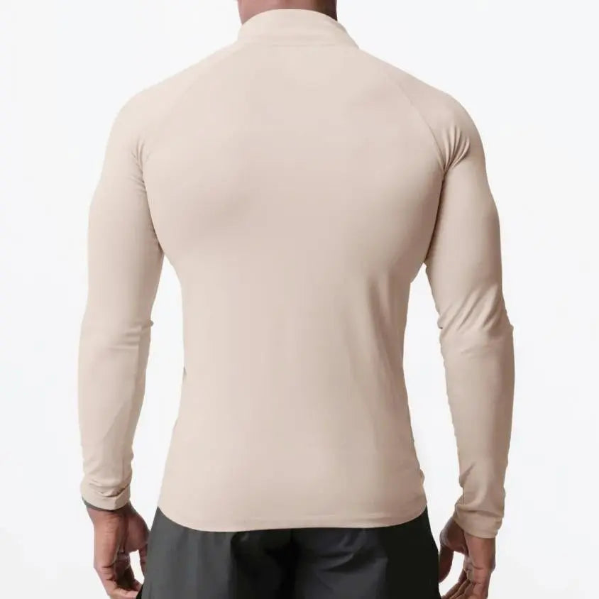 Beige men’s slim-fit quarter-zip athletic top with long sleeves – ideal for gym workouts or running