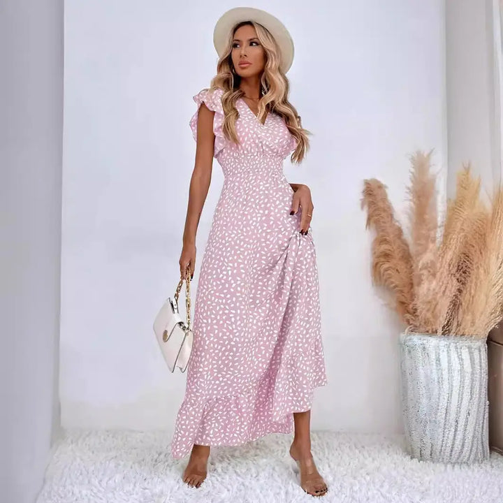 Women’s pink maxi dress with white polka dot print, flutter sleeves, and ruffle hem – elegant summer boho fashion