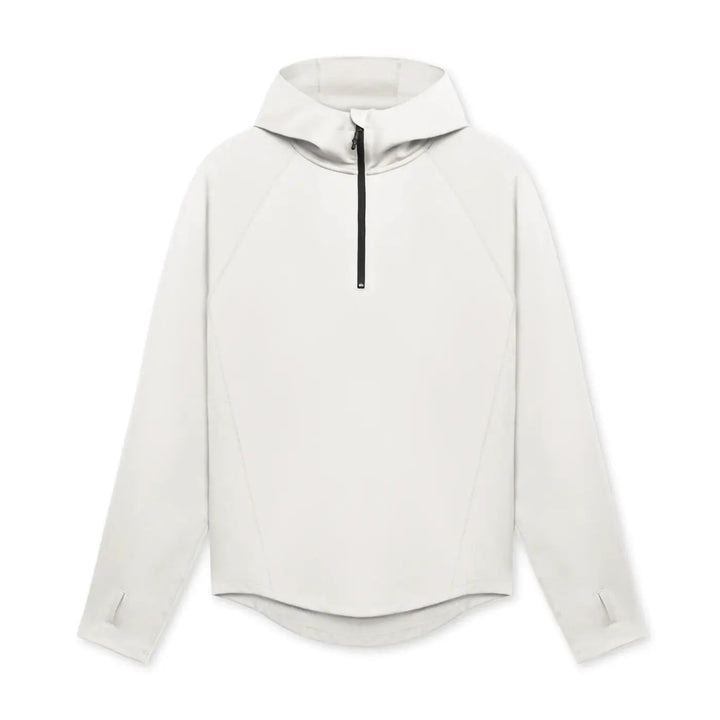 White men’s pullover hoodie with zipper neck and tapered fit – ideal for layering in athletic or casual outfits